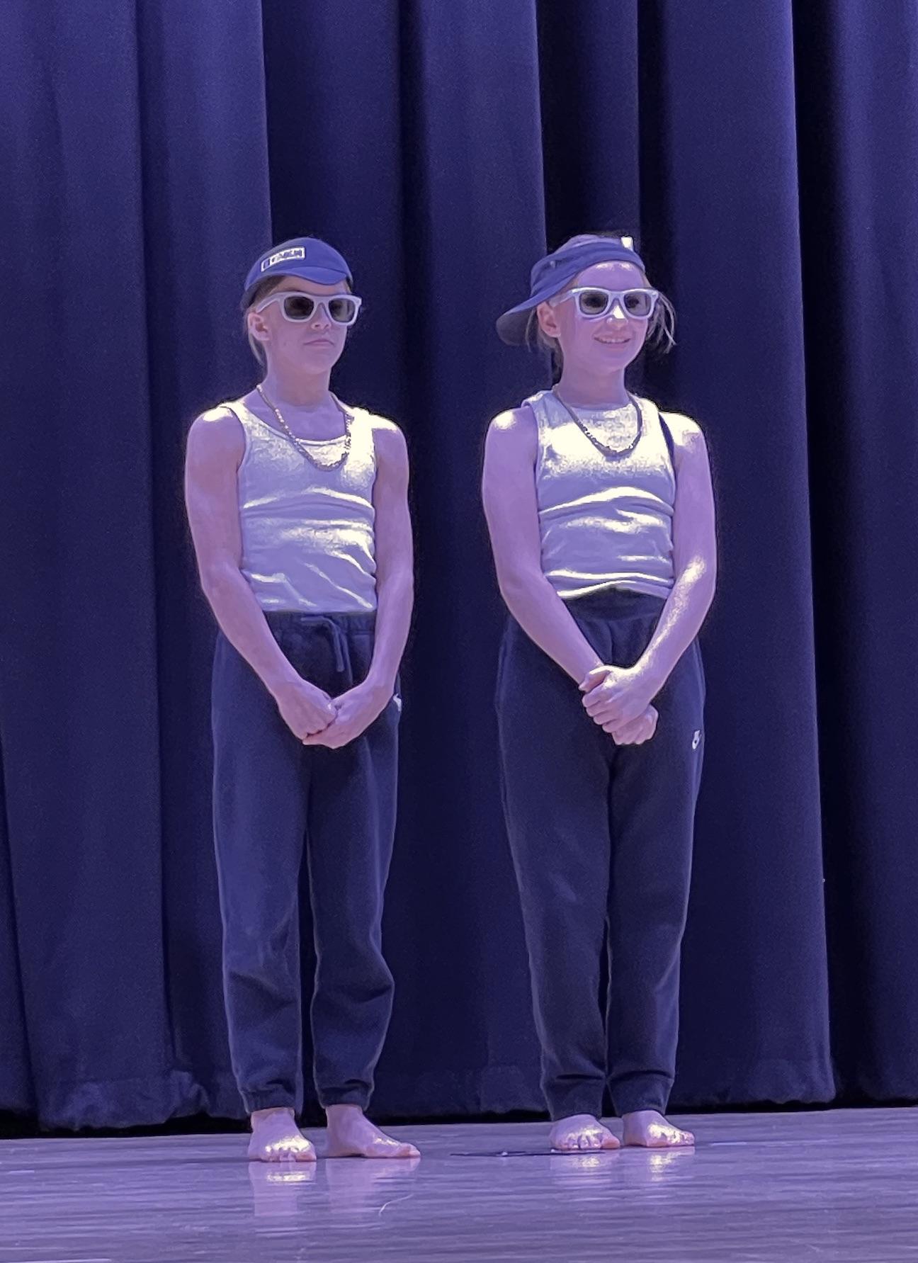 5th-graders Lillian Hawk and Kate Welsh performed a dance