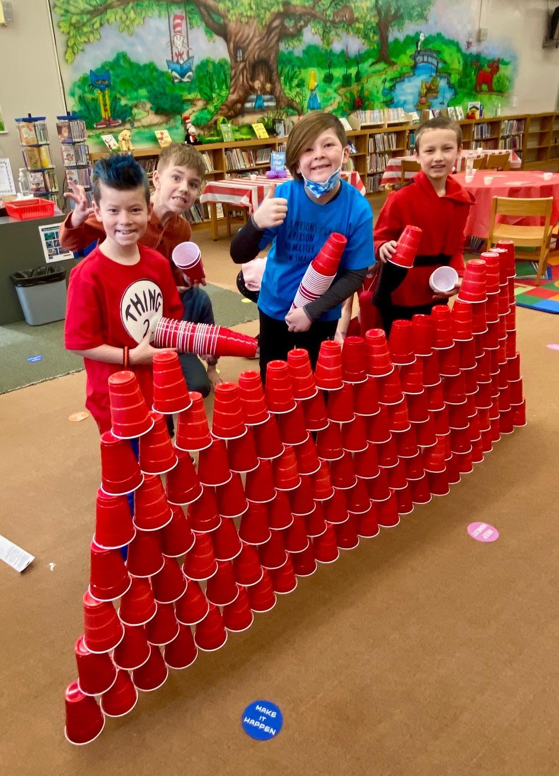 students make a giant red hat from cups