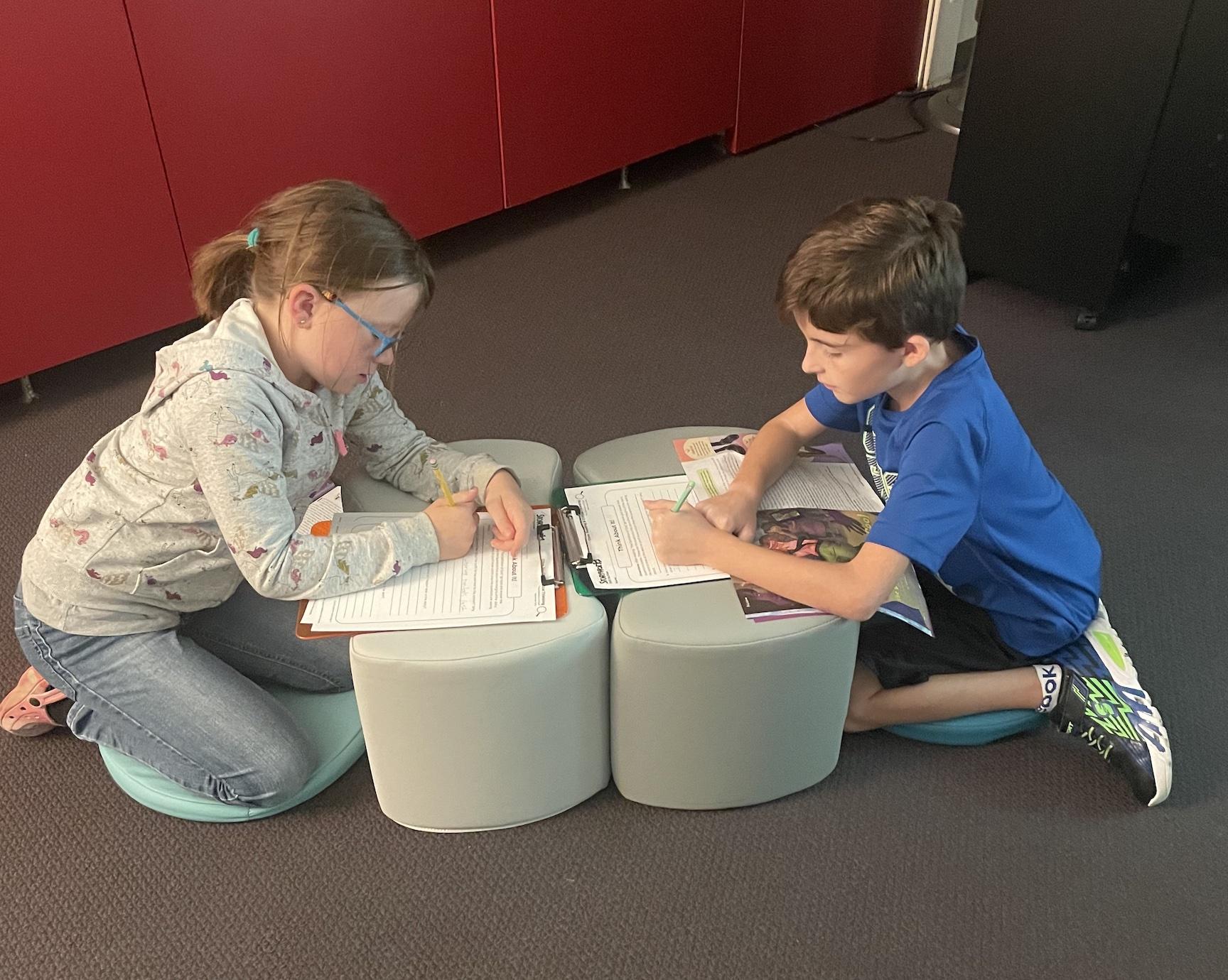 Fourth-graders Hanna Kelleher and Liam Donahue enjoy the flexible seating