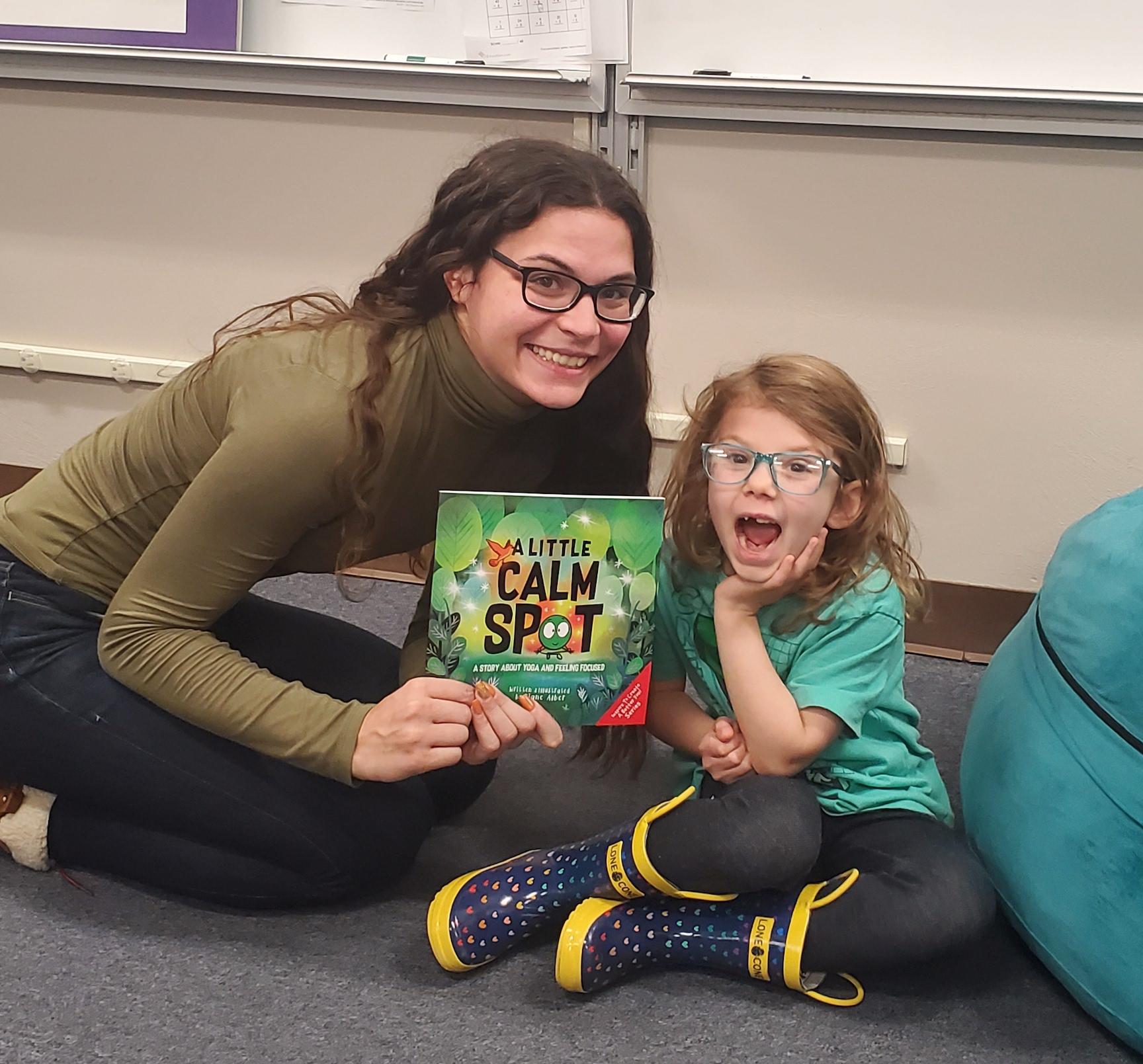 Ms. Kerestes and first-grader Kaylie Sabo read a book about calming down
