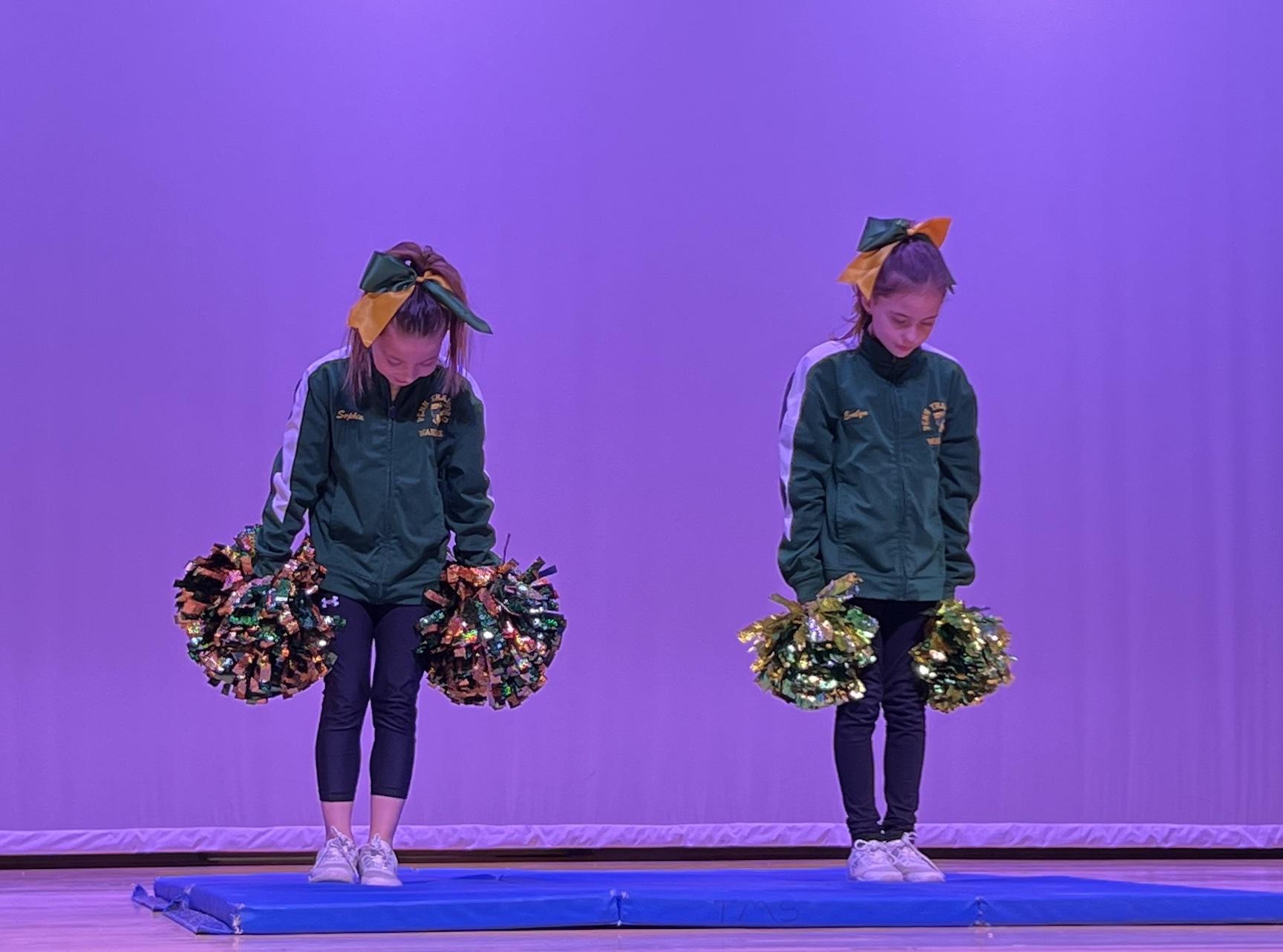 Fourth-graders Sophia Braun & Evalyn Borst showed off their cheerleading stunts